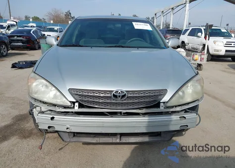 2002 Toyota Camry Le from USA, damaged, VIN JTDBE32K820024298